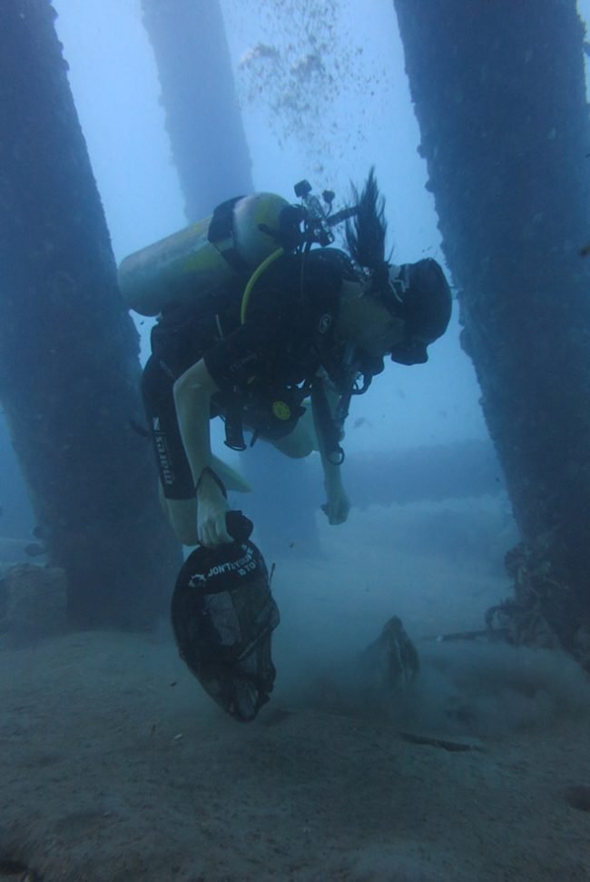 Intense concentration to maintain buoyancy while removing trash