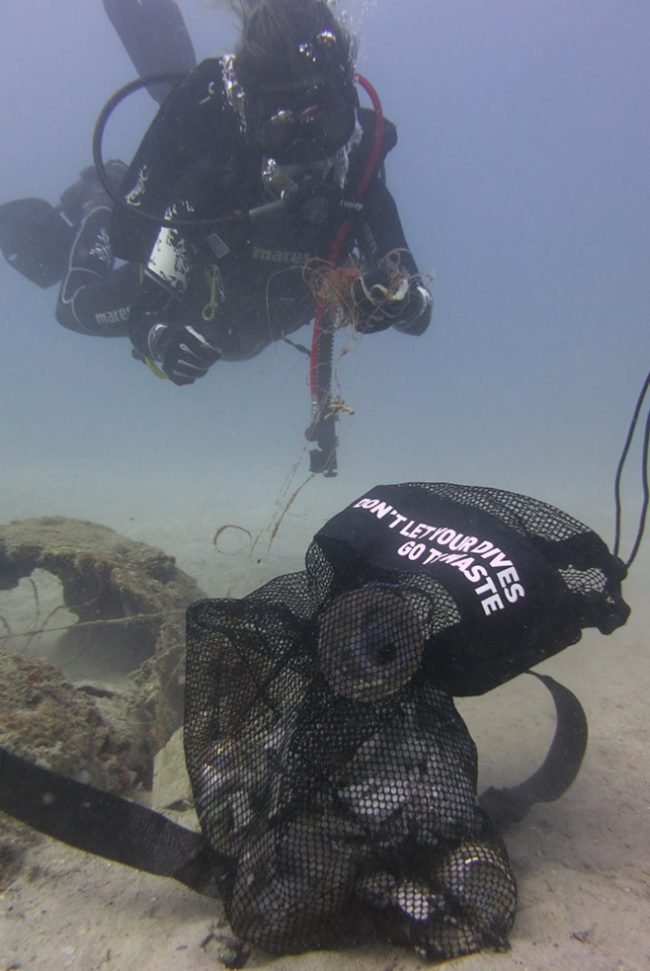 Mesh bags full of trash under Salang Jetty