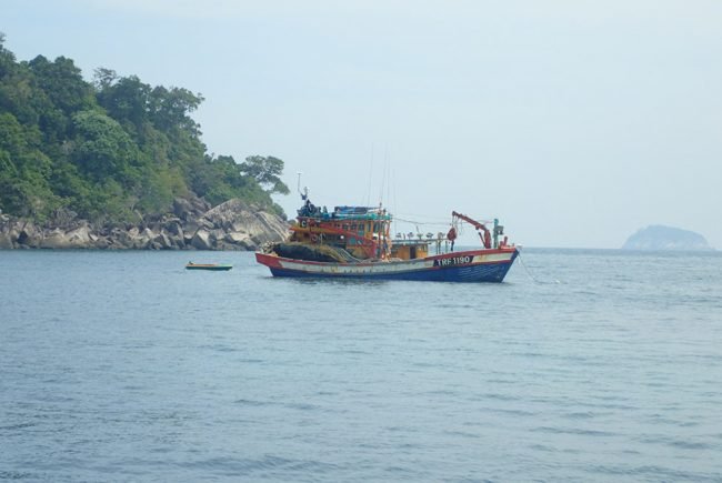 Fishing boats seek shelter in the calms of Mangrove Bay