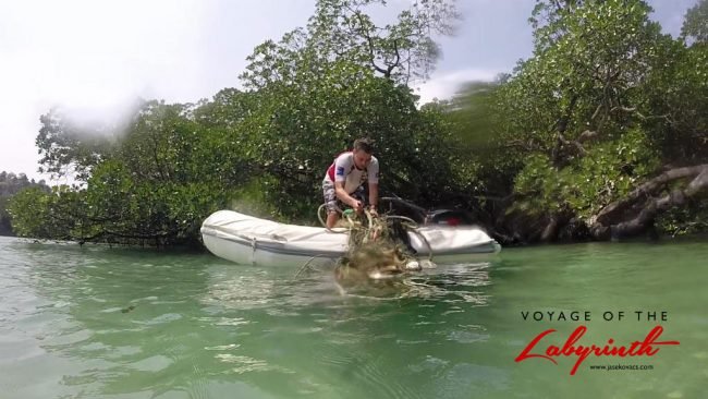 Pulling debris onto the dinghy